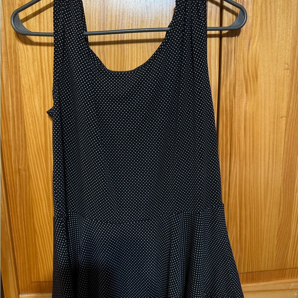 Black with small white polka dots. Like new